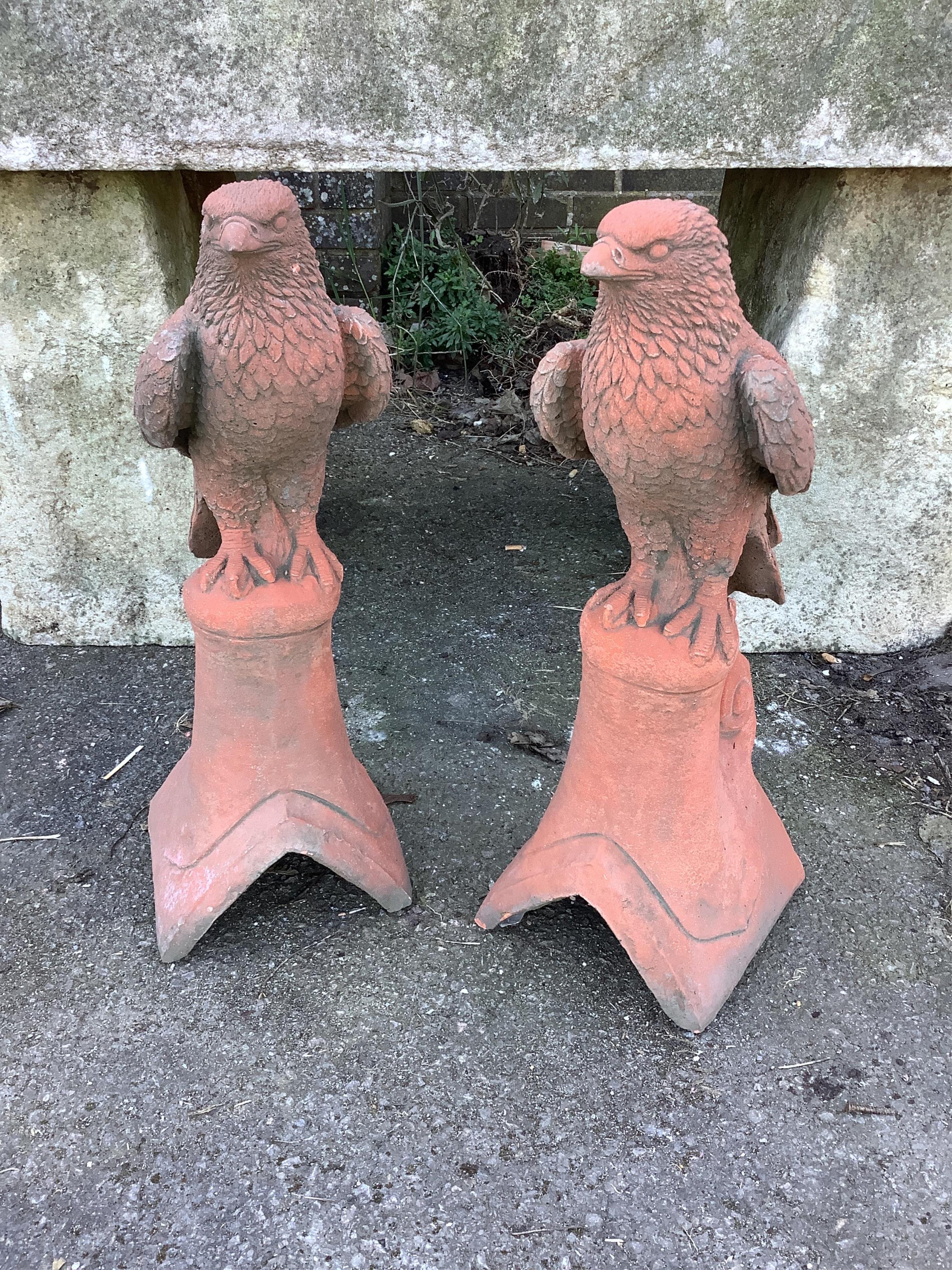 A pair of cast eagle ridge tiles, height 54cm. Condition - fair to good